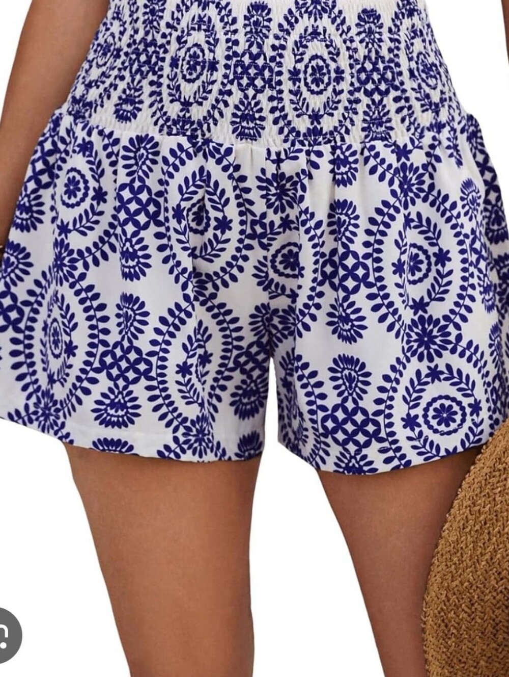 BOHEMIAN high-waisted smocked shorts designed with a loose, wide-leg cut